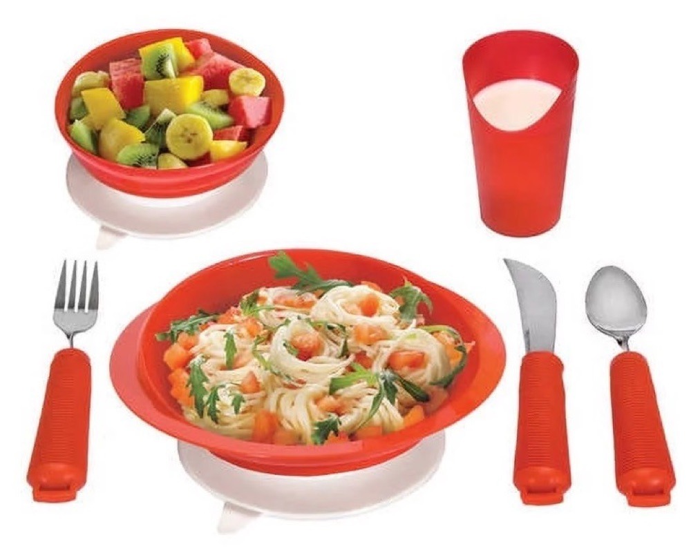Power of Red high-contrast adaptive dinnerware set with plate, bowl, cup, and utensils